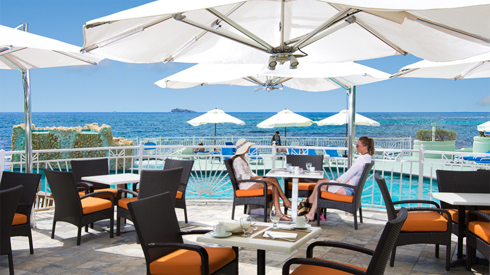 Sea view while having a drink at the pool at Oyster Bay Resort