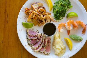 Shrimps, tuna & other Caribbean Seafood on the plate at Skipjacks restaurant