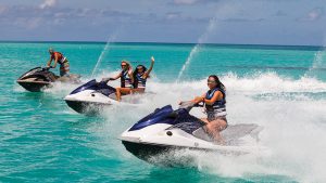 People riding jetski's on the turquoise waters of St Maarten / St Martin