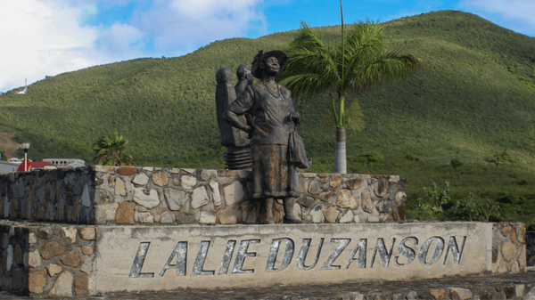 Lalie Duzanson with Tata the bus driver on roundabout