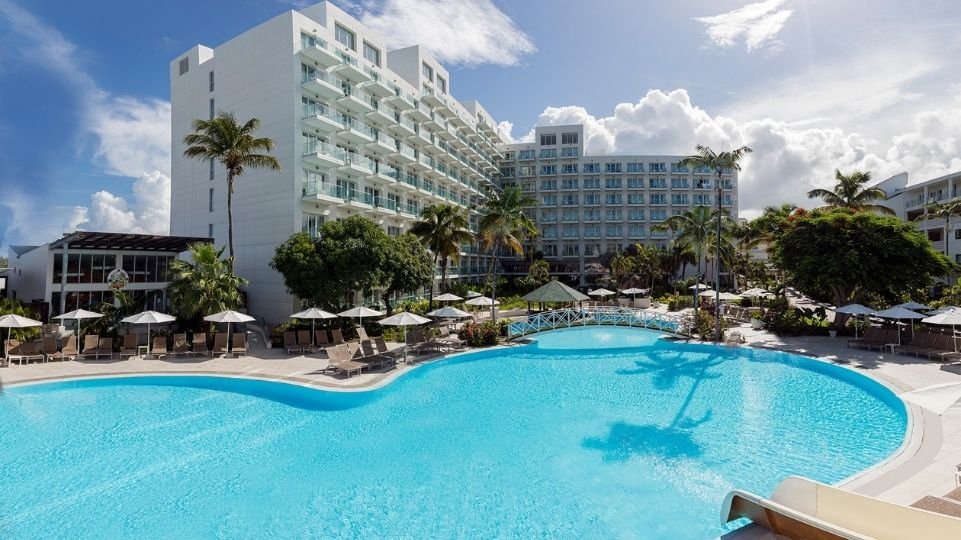 Main pool with view on main building Sonesta Maho Beach Resort Casino & Spa