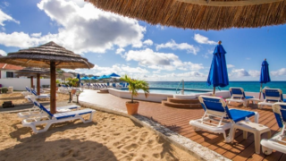 La Vista Resorts their beach with chairs and useable paraplu's at the sea
