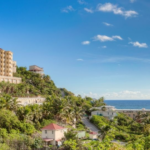 Outside view of Princess Heights on the hills of Oyster Bay with the Atlantic ocean in the background