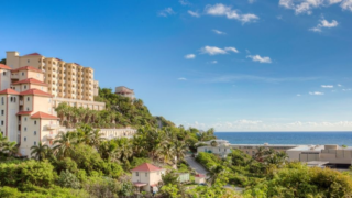Outside view of Princess Heights on the hills of Oyster Bay with the Atlantic ocean in the background