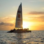 Beautiful sunset view of the Tango Catamaran in the Caribbean