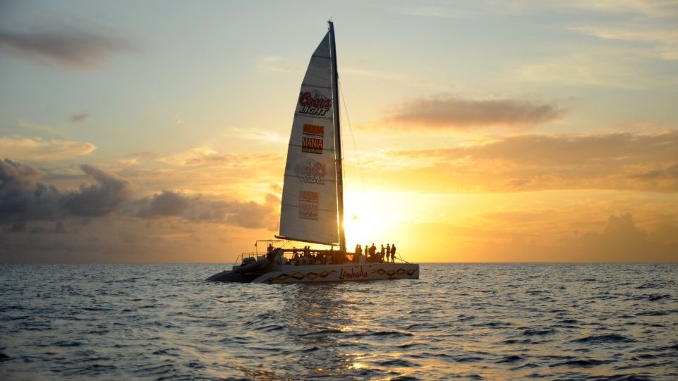 Beautiful sunset view of the Tango Catamaran in the Caribbean