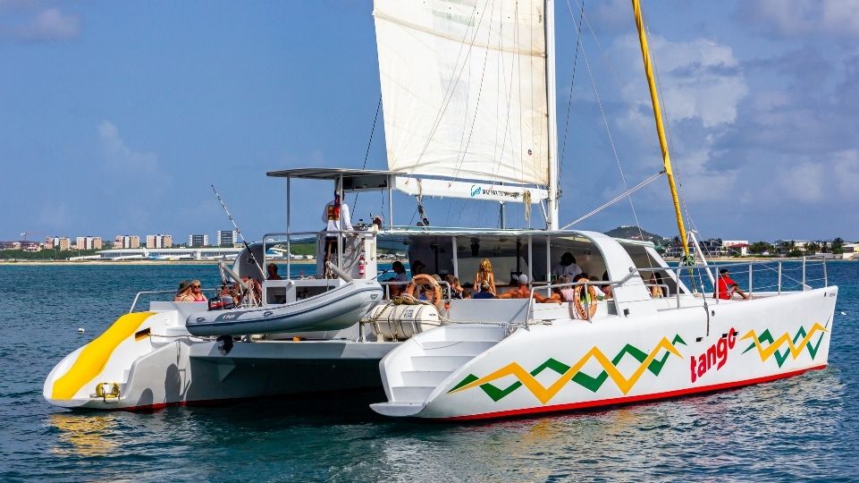 Tango Catamaran with people celebrating vacations