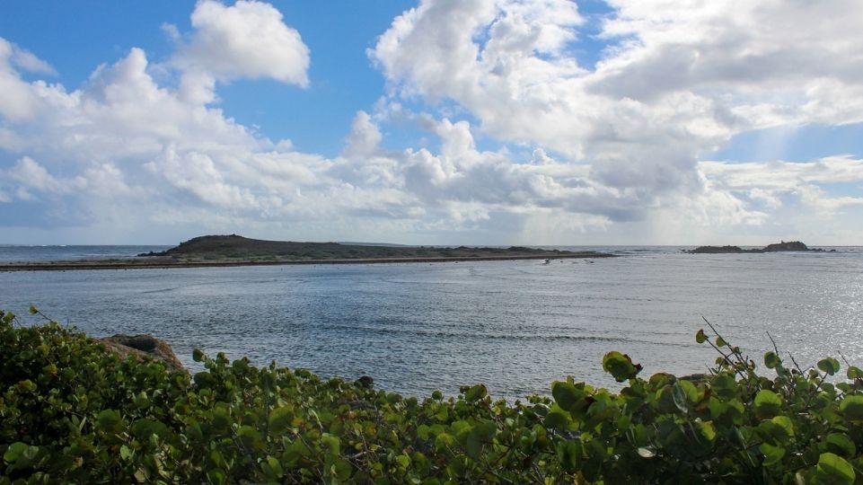 Little islands in the Bay of Embouchure on French Side St Martin with cloudy weather