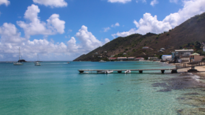 Grand case beach with lush St Martin landscape at the back