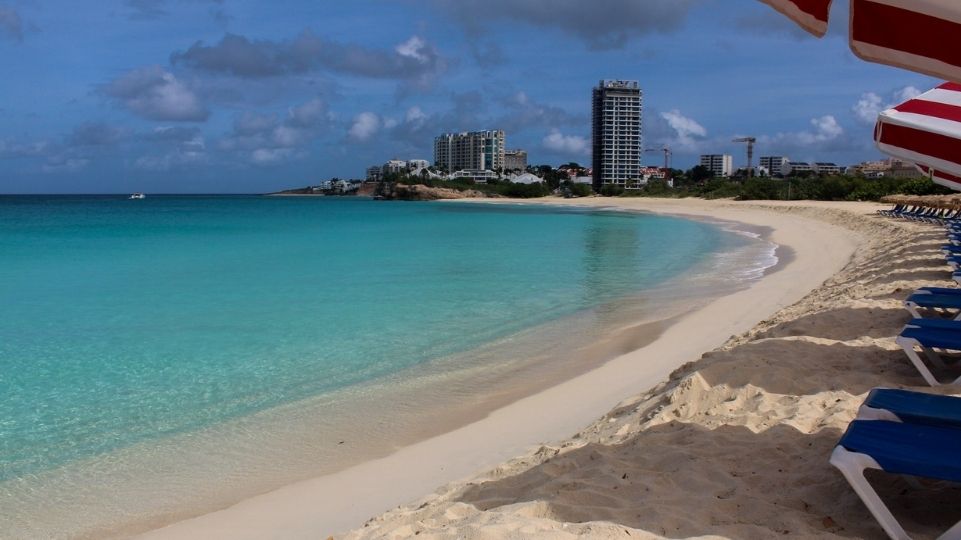 View of Mullet Bay Beach with high rise