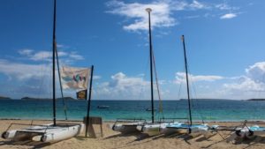 Orient Bay Beach with the catamarans and sail boats with warm St Maarten / St Martin weather