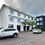 Front and parking lot of Adonis Cupecoy