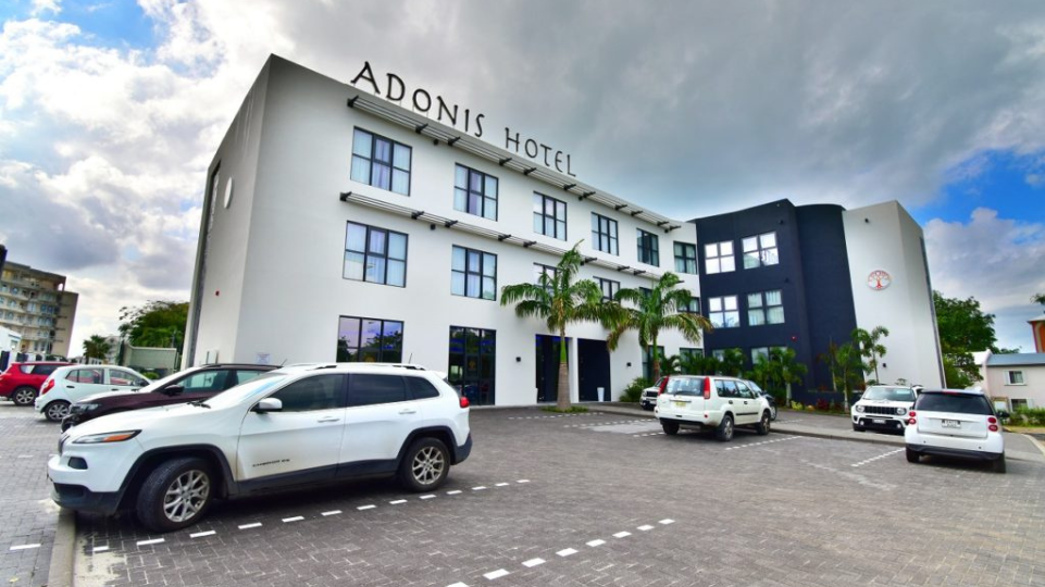 Front and parking lot of Adonis Cupecoy