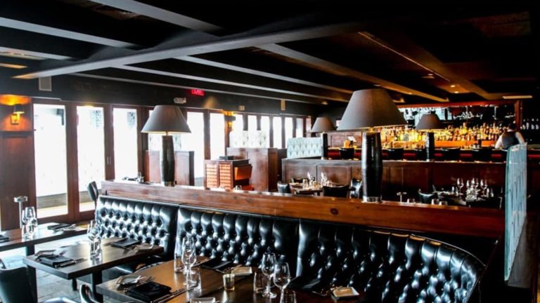 Jax Steakhouse & Cocktail Bar has a cozy atmosphere with many tables and seating areas for tourists to visit on St Maarten / St Martin