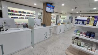 Registers and some shelves inside the store of Philipsburg Pharmacy