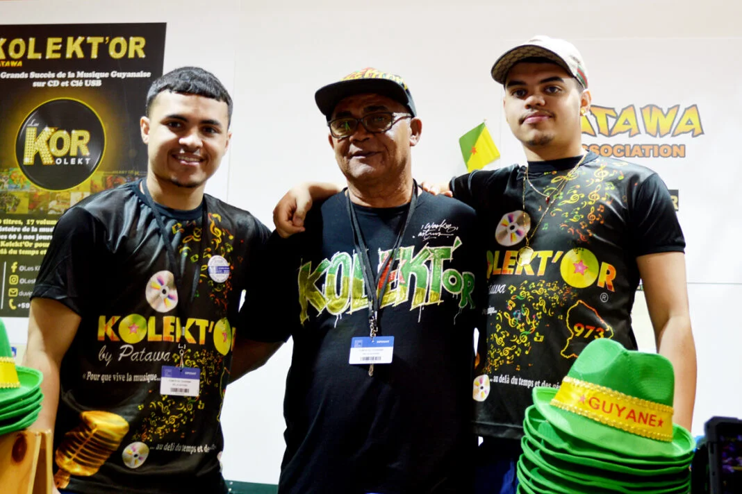 Three men representing Caribbean culture in an exhibition in Paris, where also the island of St Maarten was introduced to the audience