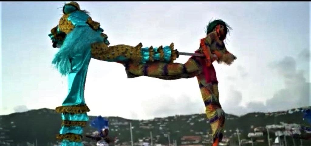 Eccentric Moko Jumbies from US Virgin Islands perform at an event