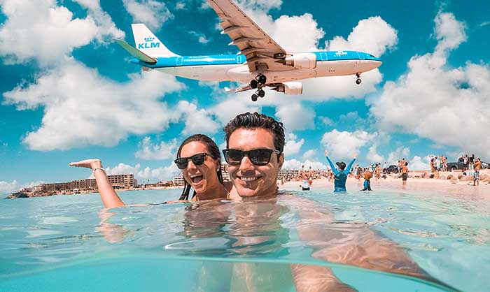 Plane landing over Maho Beach in Beatifull St Maarten Weather