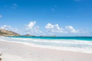 Blue turquoise water at Orient Bay Beach on the French side St Martin