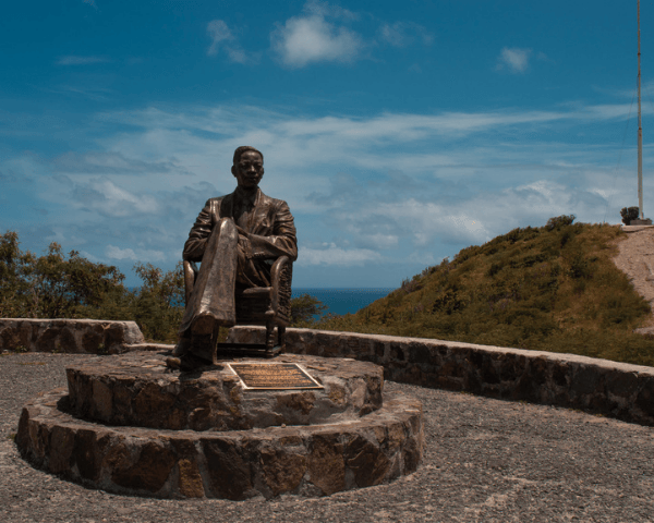 Statue William Henry Bell statue of him sitting at Harold Jack