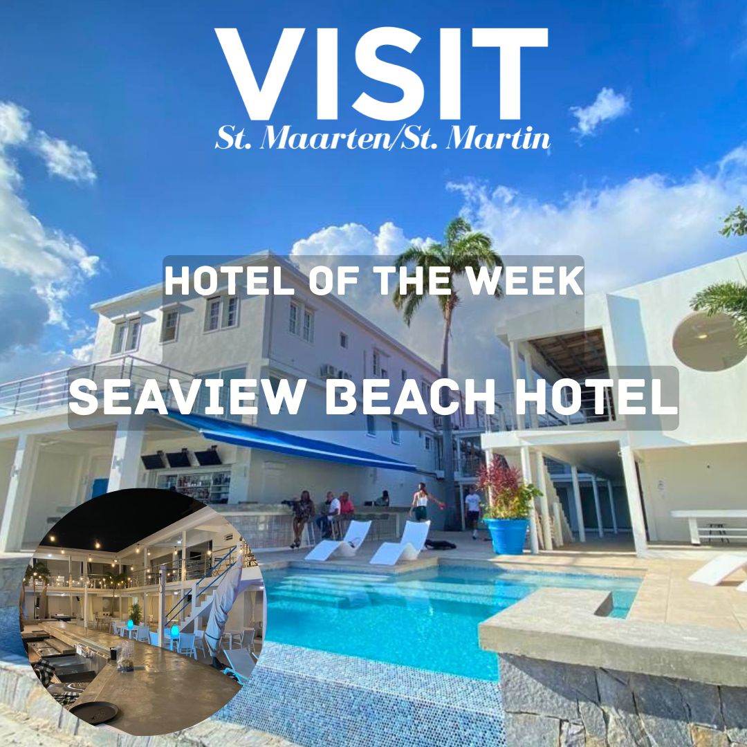 Poolside view of Seaview Beach Hotel st maarten with a night picture in the corner