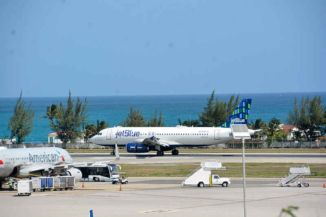 Jet Blue plane getting ready for take off on St. Maarten Airport.