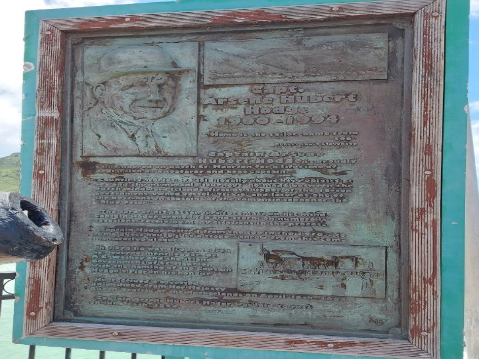 Zoomed out picture of Captain Hodge monument on the Philipsburg Pier, Boardwalk, St Maarten