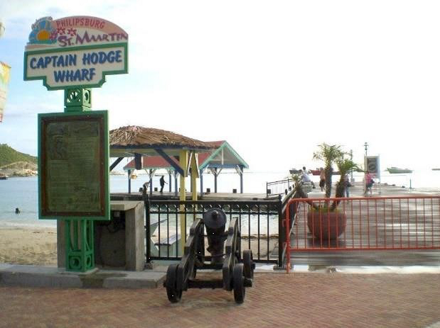 Zoomed out picture of Captain Hodge monument on the Philipsburg Pier, Boardwalk, St Maarten