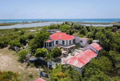 Aerial view of Orient Bay and old house
