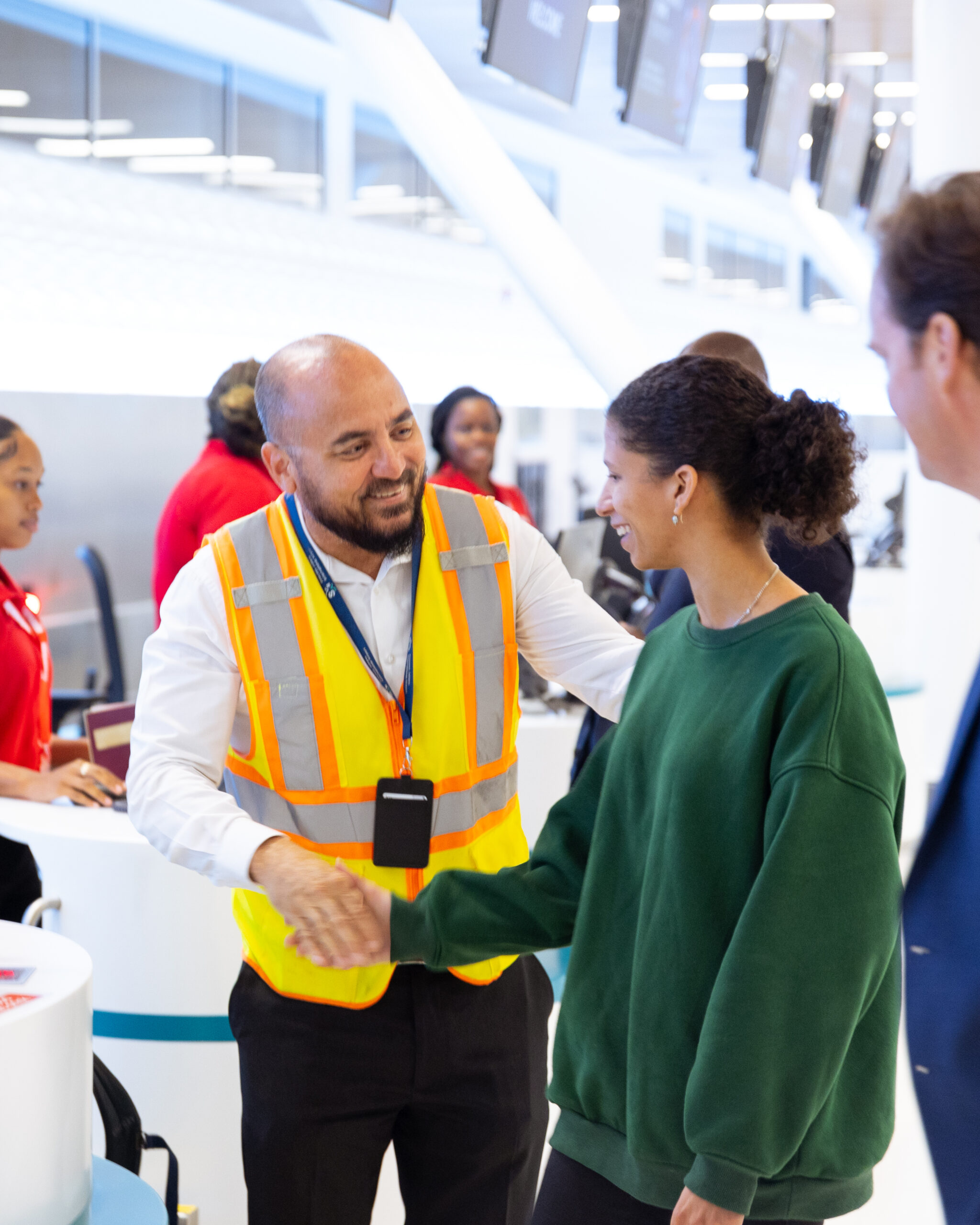 Winair Passenger being welcomed in to the brand new departure hall.