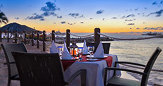 Terrace of La Patrona restaurant at Simpson Bay Resort & Marina at sunset in sunny weather 