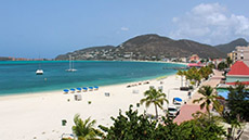 View of Philipsburgs Great Bay Beach with catamarans and Fort Amsterdam in background 