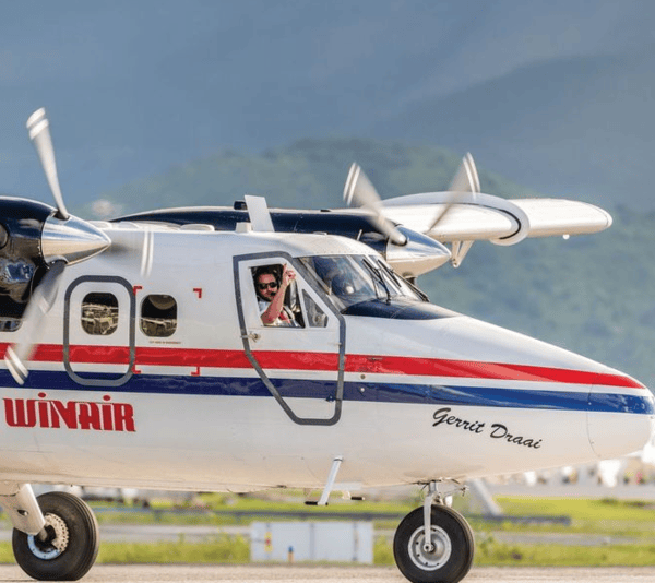 Winair plane on the runway of Princess Juliana Airport