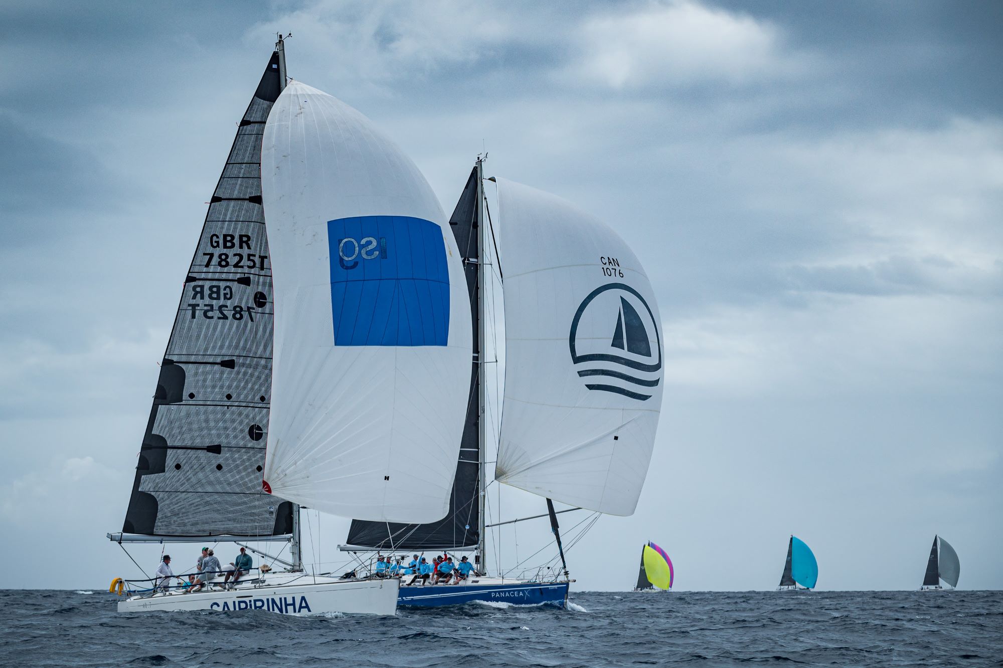 2 sailing boats on the water, competing against each other for the Heineken Regatta