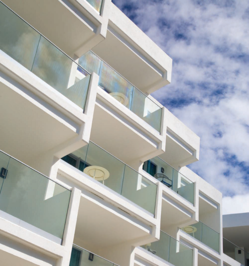 the morgan resort & spa hotelrooms from the outside with a blue sky
