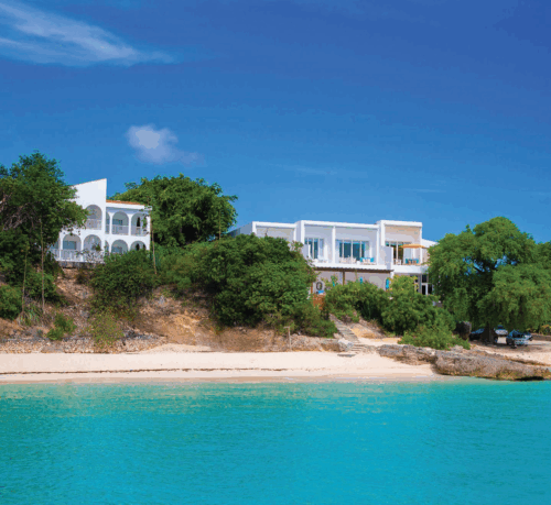 white villa at the beach of sint maarten