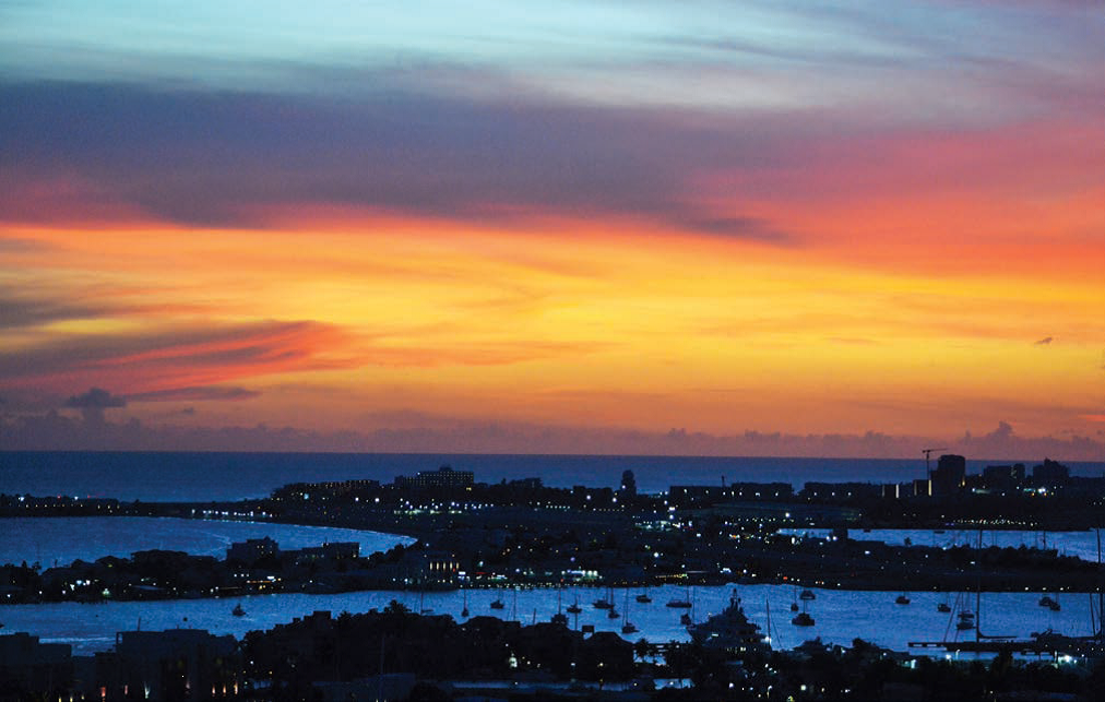 beautiful sunset on st. maarten above the sea