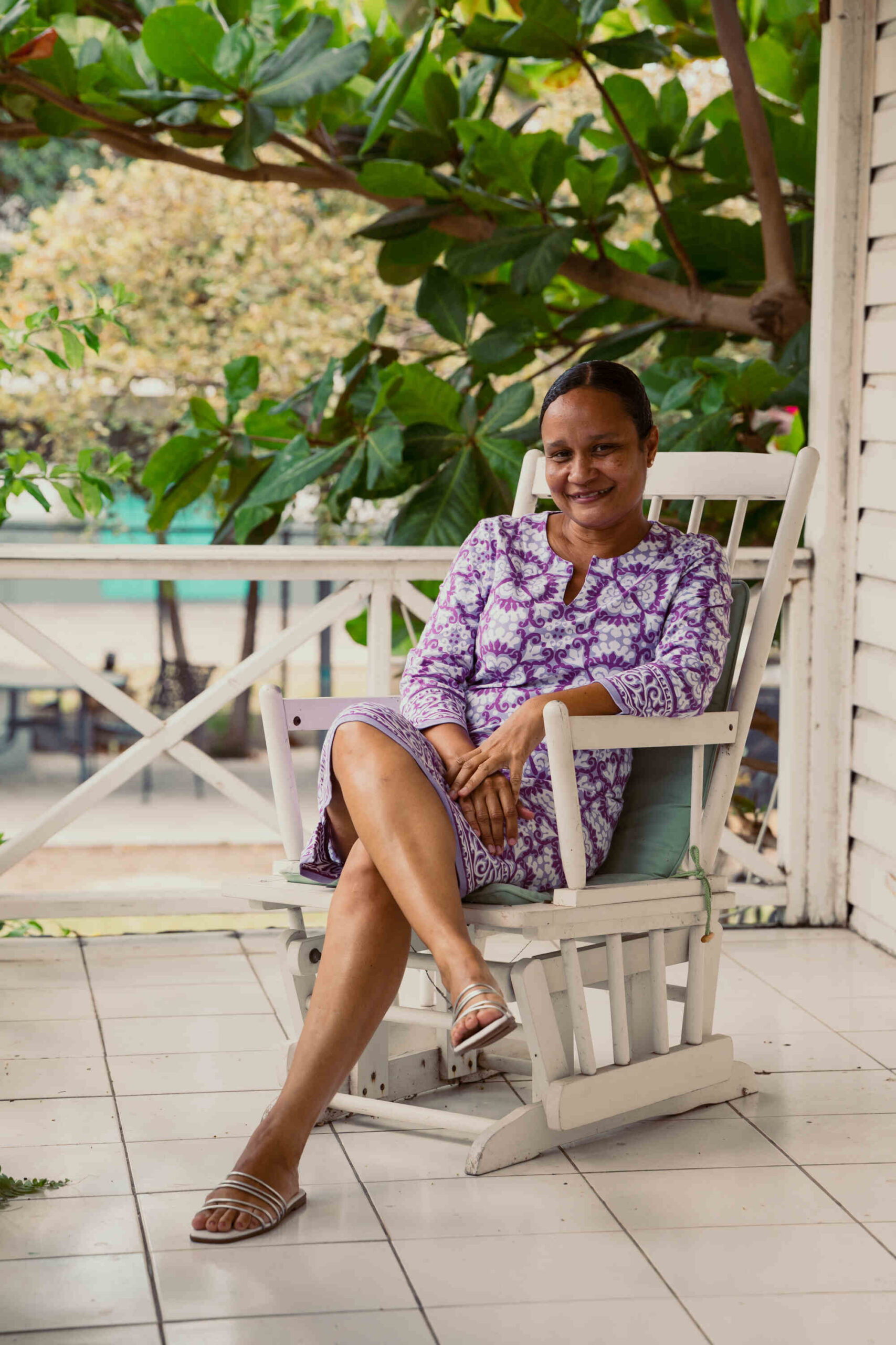 Natasha Richardson sitting on the porch at Pasture Piece SXM