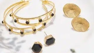 Earrings and bracelets in gold from Shopper's Haven
