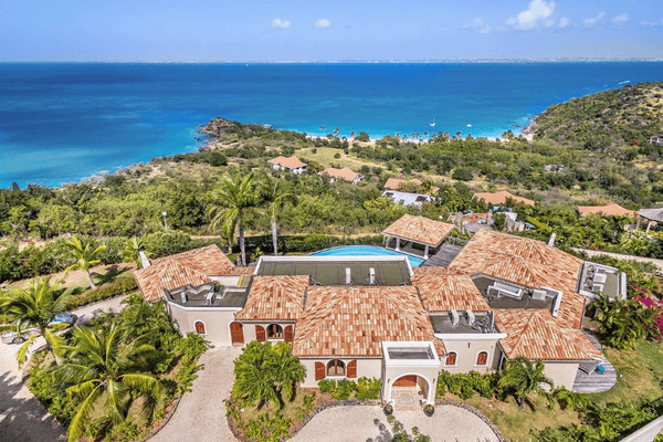 Italian style Happy Bay villa aerial view with sea