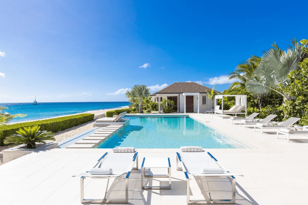 Beach chairs and pool at Villa Turtle St Maarten