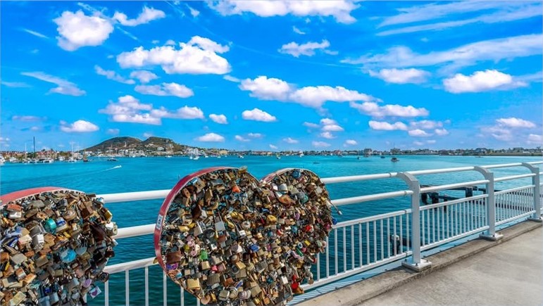 Beautiful view of st maarten with hearts filled with locks taken by Only on SXM