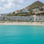 Full resort view on Belair Beach Hotel seen from little Bay Beach near Philipsburg