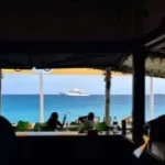 View of Mega Yacht Faith from D's Beach Bar