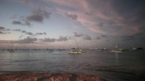 Boats on the sea near grand case looking like a sky full of stars