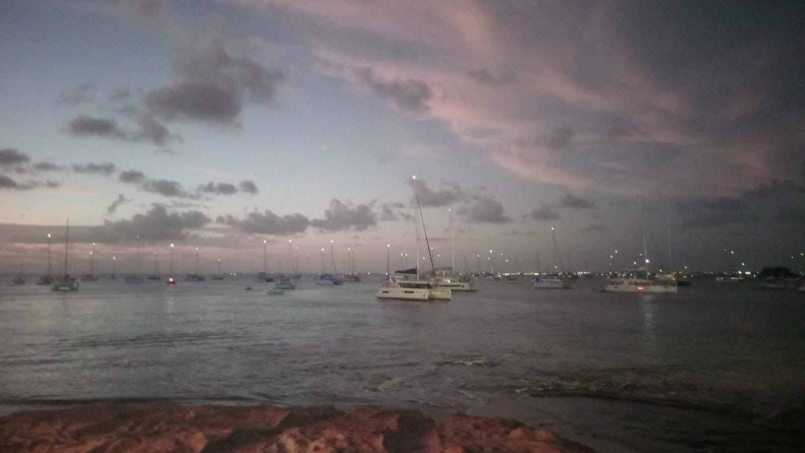Boats on the sea near grand case looking like a sky full of stars
