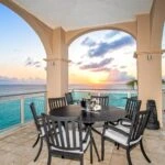 Villa on the balcony by the sunset and the sea  