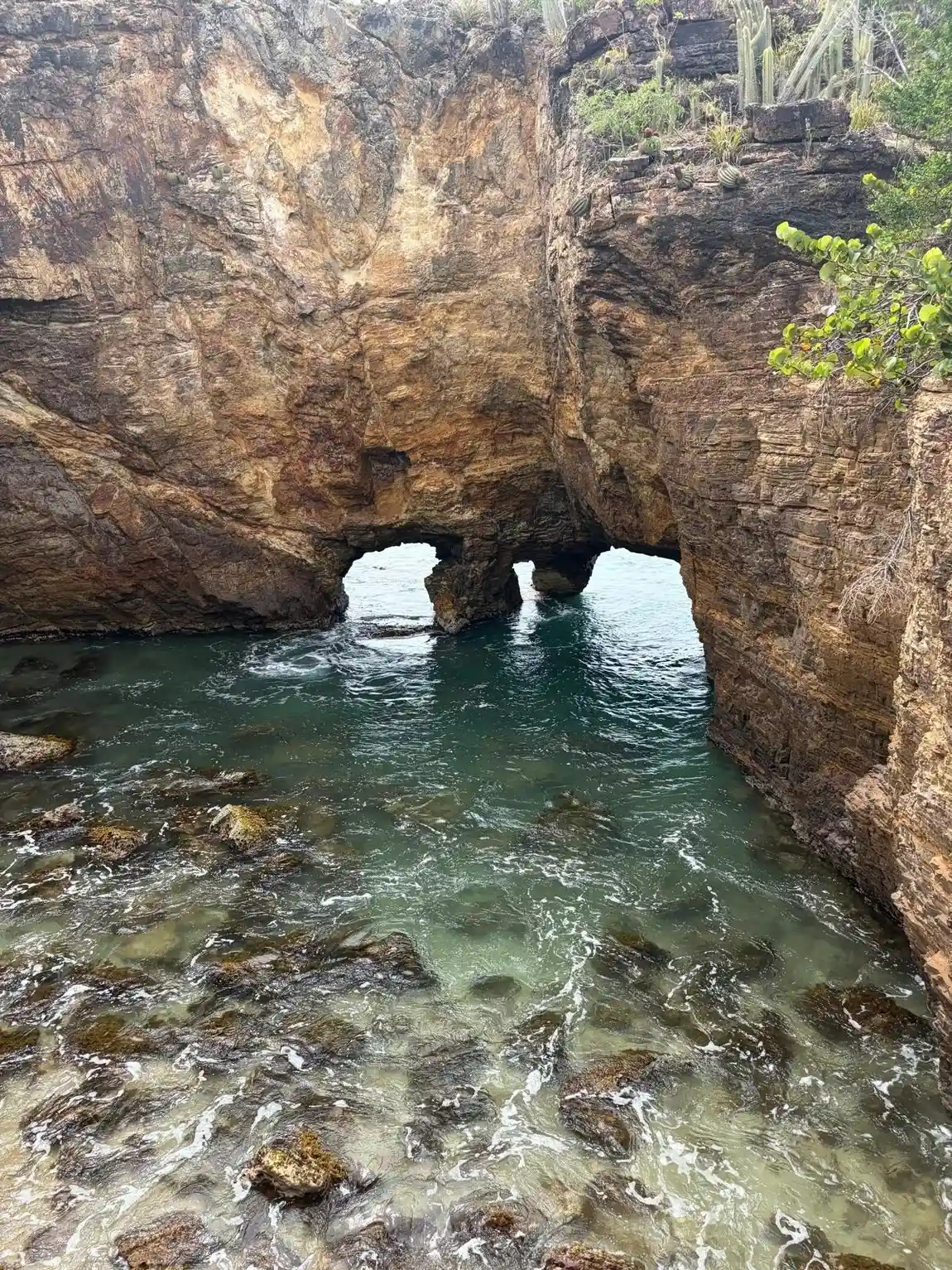 Pointe du Bluff hole formation in the rocks