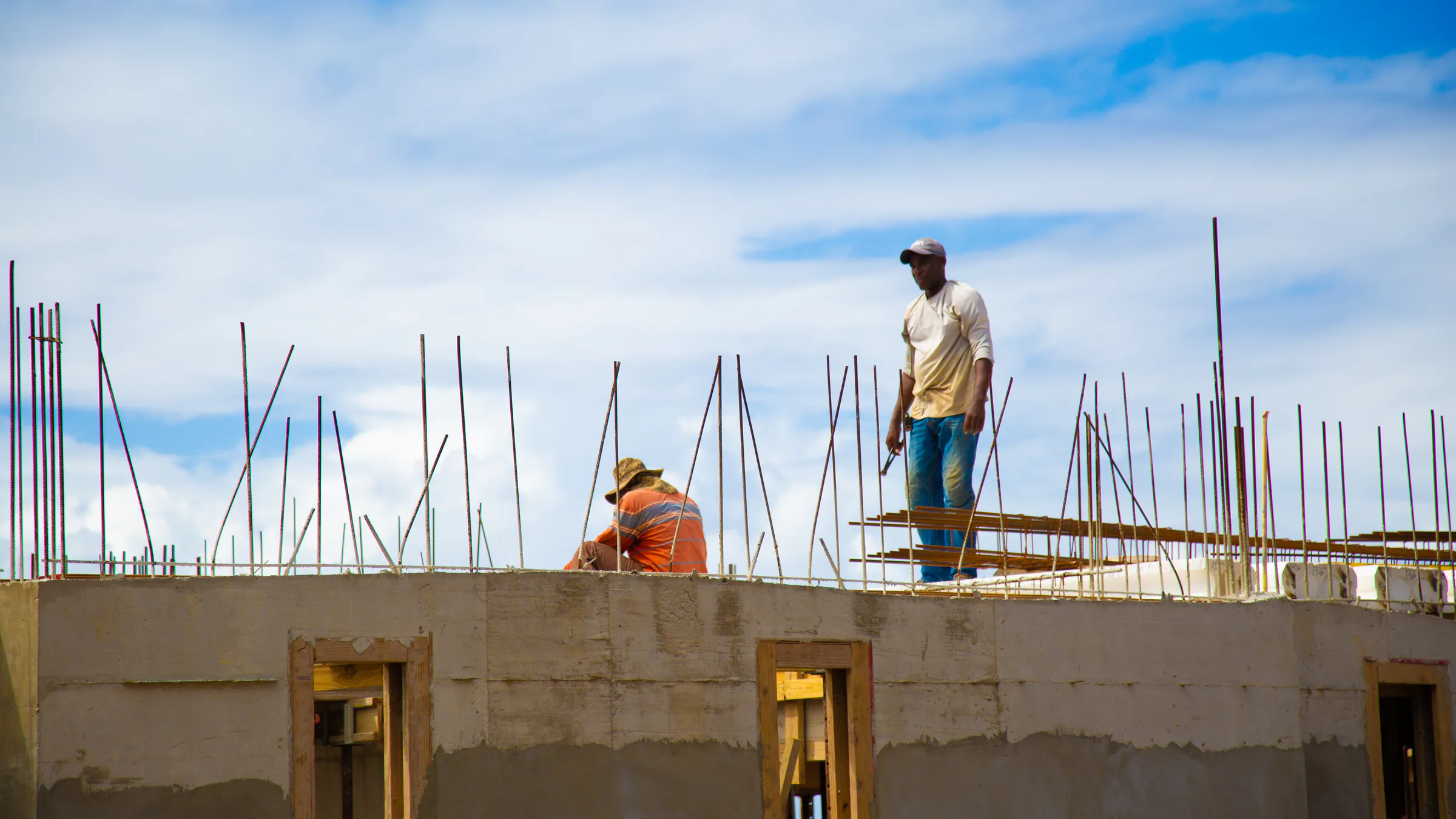 Construction workers build a property in St. Maarten.