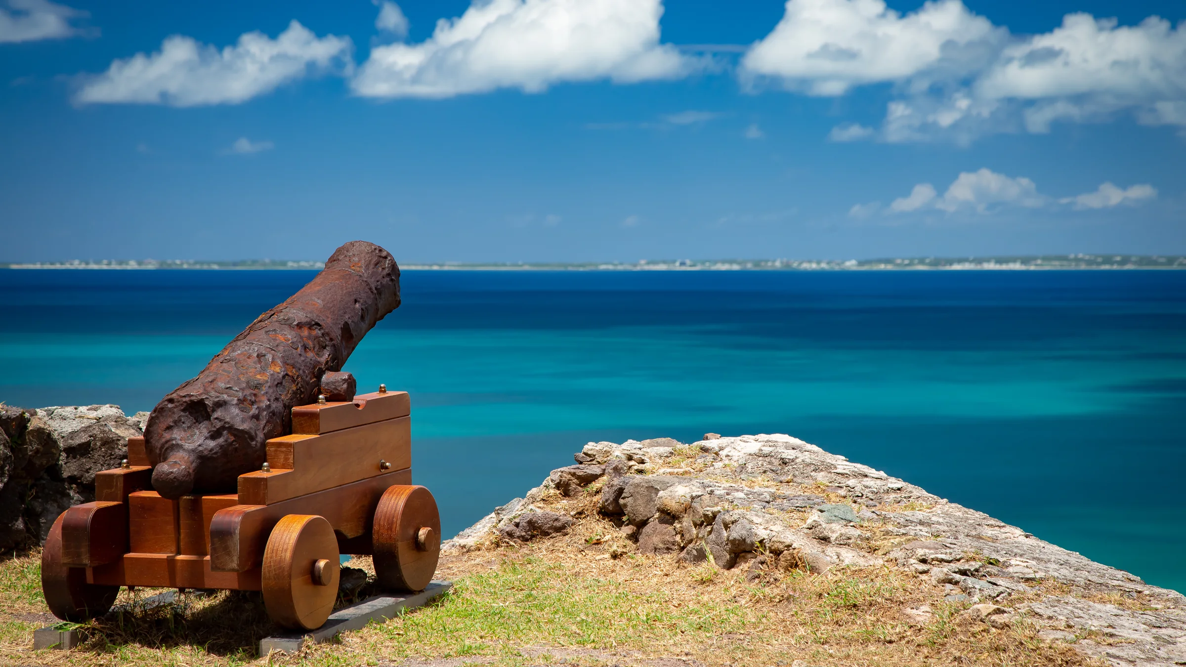 Historic cannon at Fort St. Louis overlooks the Caribbean Sea and Marigot.